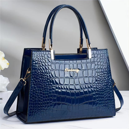 Valloré | Handtasche in glänzendem Krokodil-Design